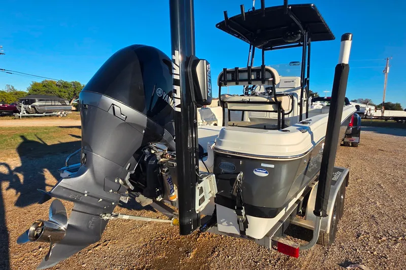 Slide: The Image of 2017 NauticStar 231 Angler boat with Yamaha outboard engine on trailer. - 5