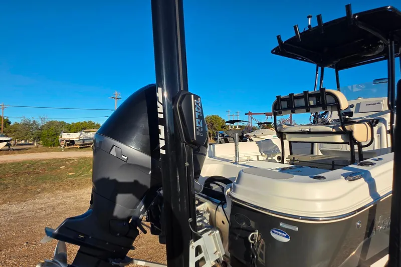 Slide: The Image of 2017 NauticStar 231 Angler boat with Talon anchor system, outdoor setting. - 6