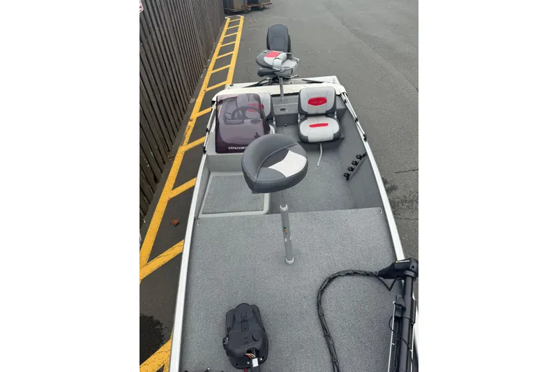 Slide: The Image of 2015 Tracker Pro 160 fishing boat interior with seating and equipment. - 4