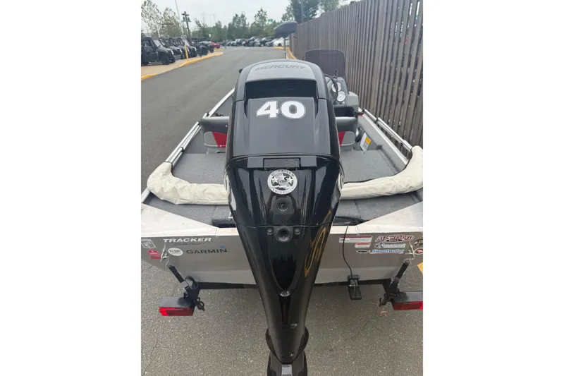 Slide: The Image of 2015 Tracker Pro 160 boat with Mercury 40 engine, parked on a trailer. - 6