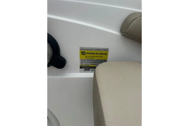 Slide: The Image of 2023 Hurricane SunDeck Sport 205 OB capacity label, seating for 10 people or 1308 lbs. - 11