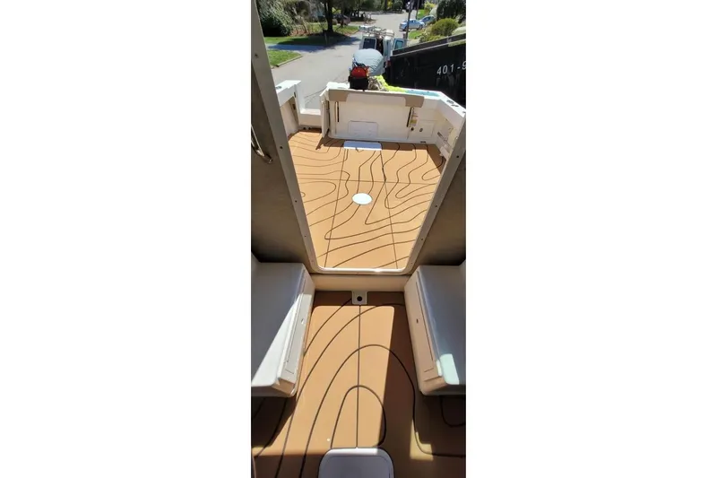 Slide: The Image of Interior view of 2019 Parker 2520 XL Sport Cabin with wooden flooring. - 11