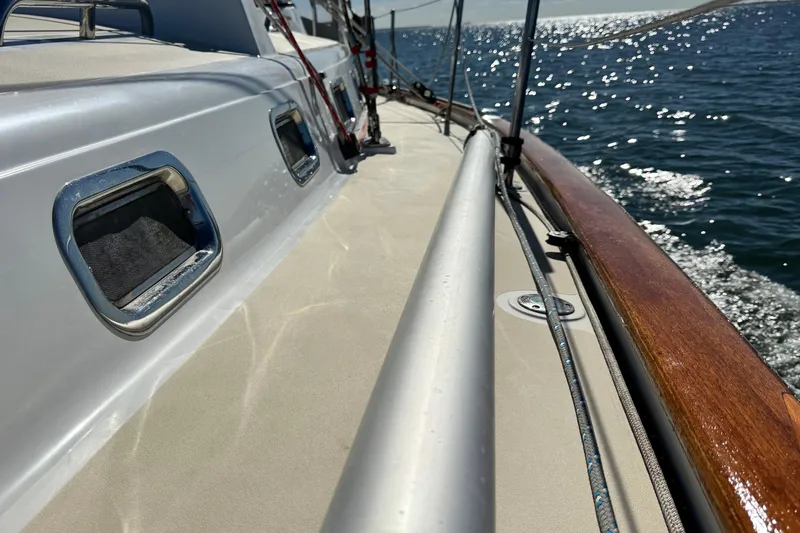 Slide: The Image of Deck view of 2013 Tartan 4000 sailboat on sunny ocean day. - 25