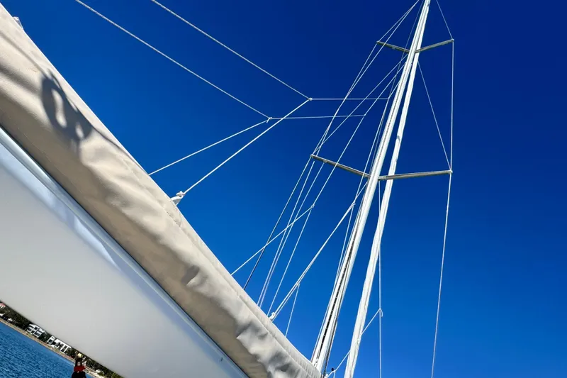 Slide: The Image of Sailboat mast and rigging against clear blue sky, Tartan 4000, 2013 model. - 37