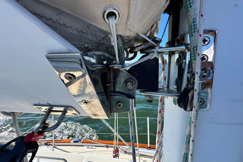 Slide: The Image of Close-up of Tartan 4000 sailboat rigging, showcasing detailed hardware and ropes, 2013 model. - 38