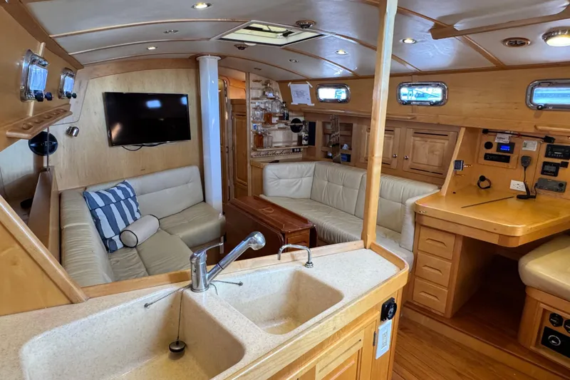 Slide: The Image of Luxurious interior of 2013 Tartan 4000 yacht with modern amenities and wooden finishes. - 50