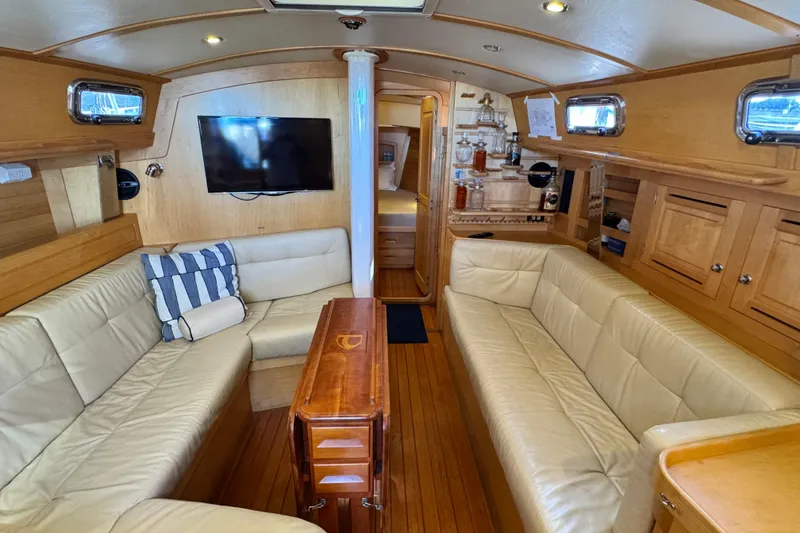 Slide: The Image of Luxurious interior of 2013 Tartan 4000 yacht with leather seating and wooden finishes. - 52