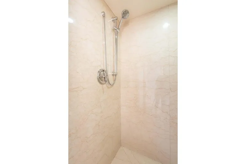 Slide: The Image of Luxurious marble shower in 1995 Christensen Tri-Deck yacht bathroom. - 21