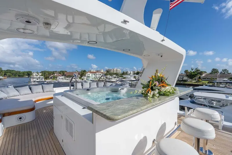 Slide: The Image of Luxurious 1995 Christensen Tri-Deck yacht with jacuzzi and scenic marina view. - 33