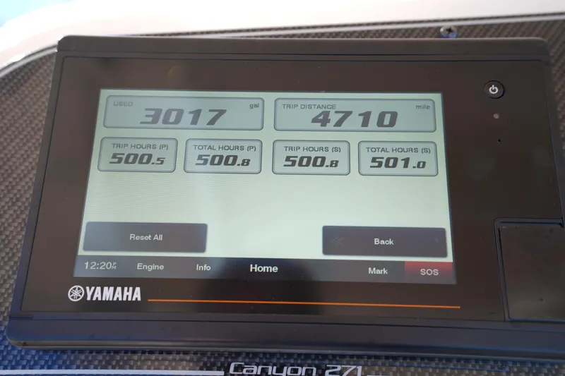 Slide: The Image of Yamaha display on 2021 Grady-White Canyon 271 showing trip data and engine hours. - 33