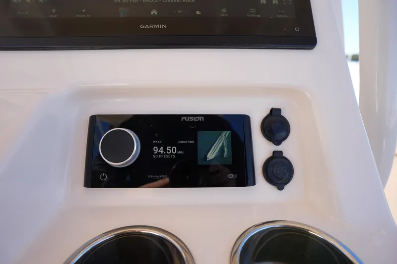 Slide: The Image of Fusion stereo system on 2021 Grady-White Canyon 271 boat dashboard. - 43