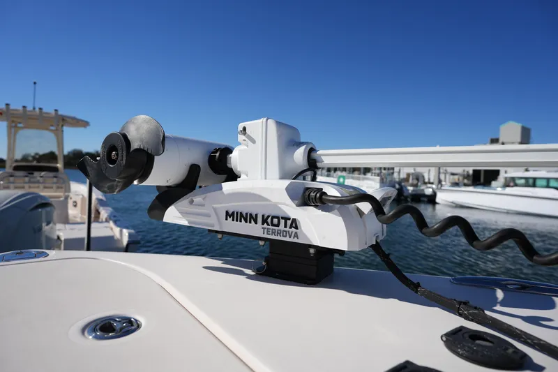 Slide: The Image of Minn Kota Terrova motor on 2021 Grady-White Canyon 271 boat, docked in marina. - 49