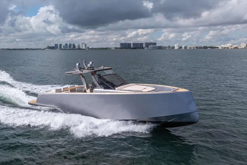 Slide: The Image of 2021 Pardo Yachts 43 cruising on open water under cloudy skies. - 3