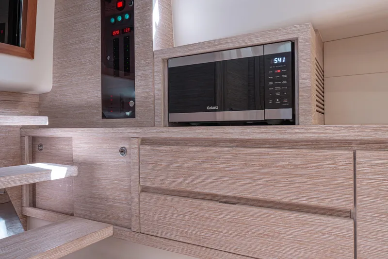Slide: The Image of Modern kitchen interior of 2021 Pardo Yachts 43, featuring a built-in microwave. - 40