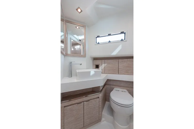 Slide: The Image of Modern bathroom interior on 2021 Pardo Yachts 43, featuring sleek sink and toilet design. - 42