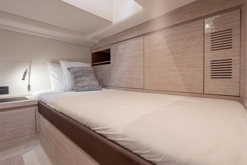 Slide: The Image of Interior cabin of 2021 Pardo Yachts 43, featuring a cozy bed and modern design. - 45