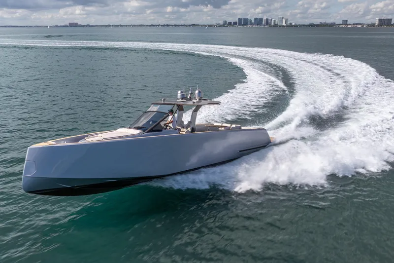 Slide: The Image of 2021 Pardo Yachts 43 cruising on open water, leaving a dynamic wake behind. - 5