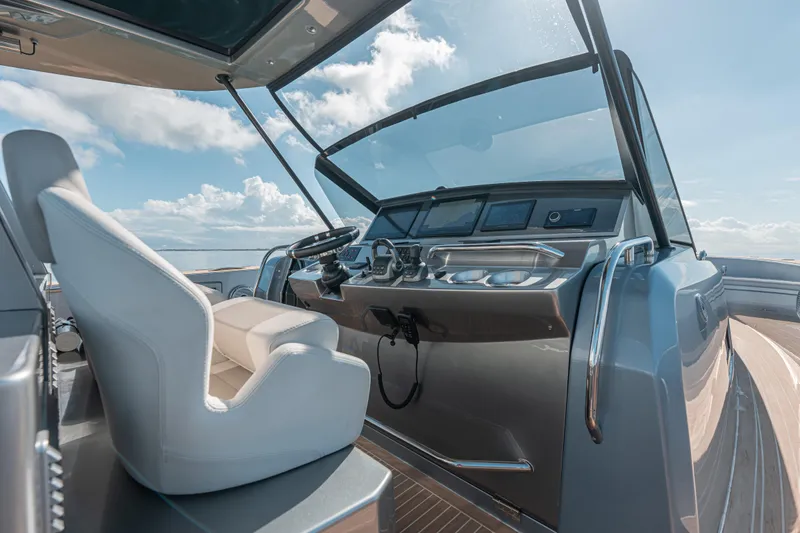 Slide: The Image of Cockpit of 2021 Pardo Yachts 43 with modern controls and luxurious seating. - 26