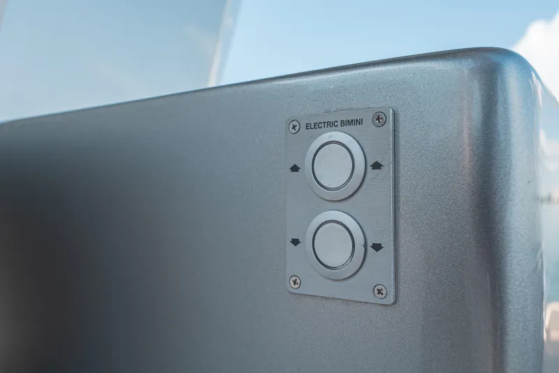 Slide: The Image of Electric bimini control panel on 2021 Pardo Yachts 43, featuring sleek metallic design. - 34