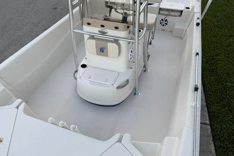 Slide: The Image of 2016 Carolina Skiff 198 DLV boat interior with center console and seating. - 24