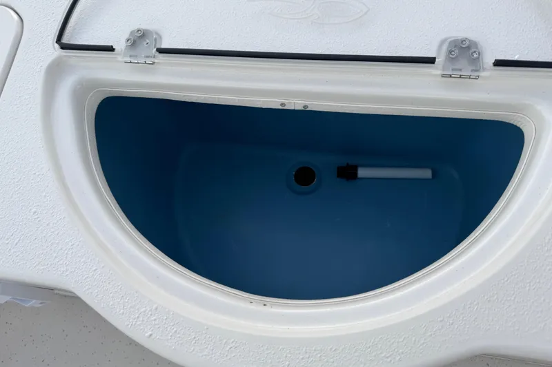 Slide: The Image of Open storage compartment in 2016 Carolina Skiff 198 DLV boat. - 28