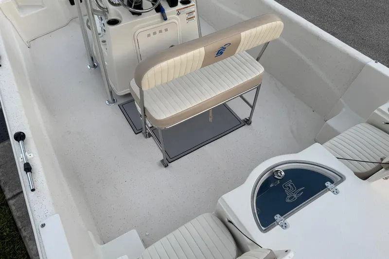 Slide: The Image of 2016 Carolina Skiff 198 DLV interior with seating and console details. - 34