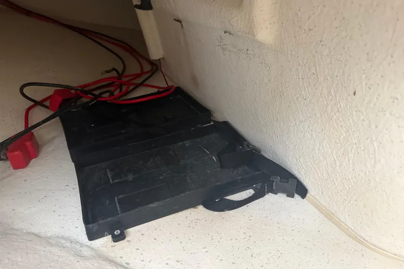 Slide: The Image of Battery compartment with wiring in 2016 Carolina Skiff 198 DLV boat. - 42