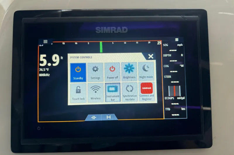 Slide: The Image of Simrad display on 2016 Carolina Skiff 198 DLV showing system controls and depth reading. - 44