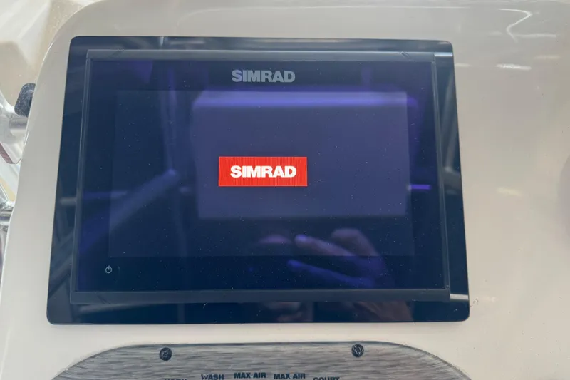 Slide: The Image of Simrad display on 2016 Carolina Skiff 198 DLV boat dashboard. - 47