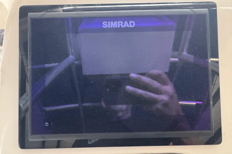 Slide: The Image of Simrad display on 2016 Carolina Skiff 198 DLV boat dashboard. - 48