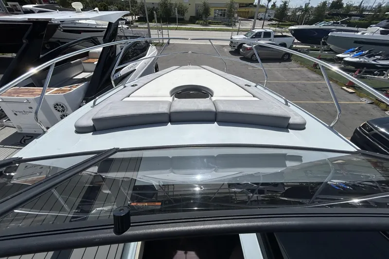 Slide: The Image of Front view of 2025 L'ACQUA LR350 yacht, showcasing sleek design and spacious deck. - 11