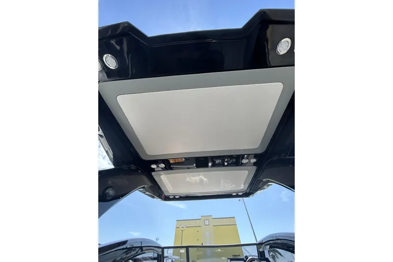 Slide: The Image of Rooftop view of 2025 L'ACQUA LR350 with sunroof and lights against blue sky. - 16