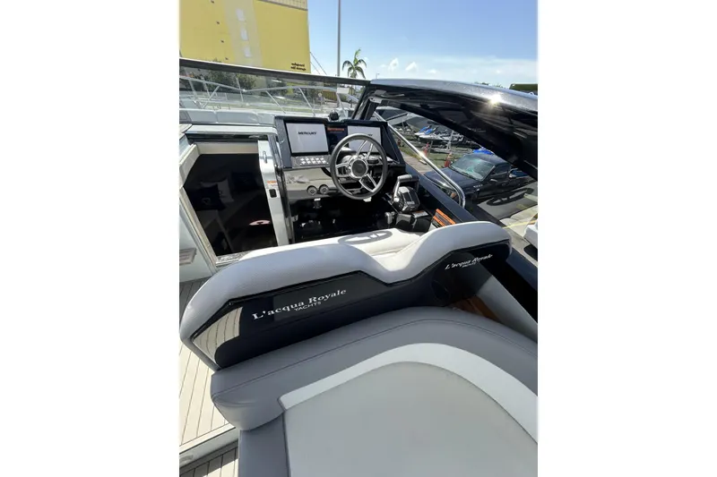 Slide: The Image of Interior view of 2025 L'ACQUA LR350 yacht cockpit with modern steering and controls. - 17