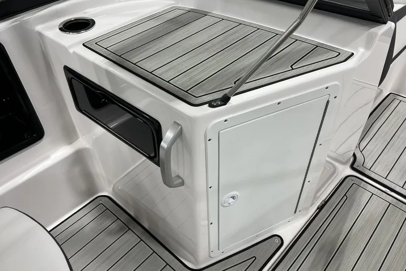 Slide: The Image of 2025 Yamaha Boats 195S interior with sleek, modern design and wood-style flooring. - 9