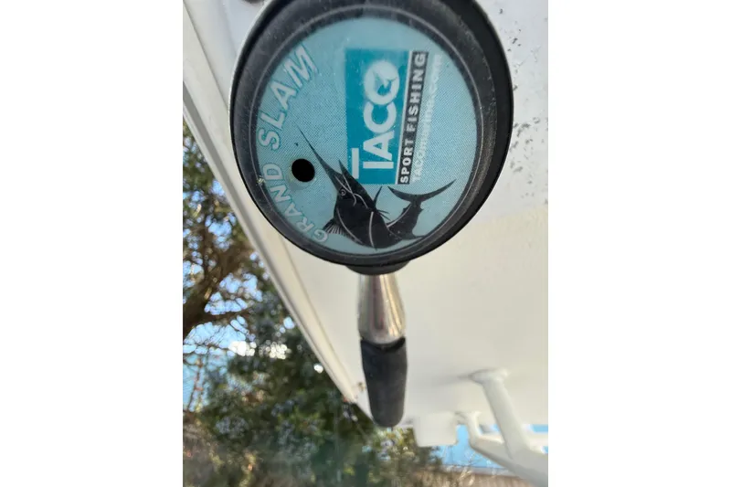 Slide: The Image of Taco Sport Fishing Grand Slam logo on 2012 Tidewater 250 CC Adventure boat. - 23