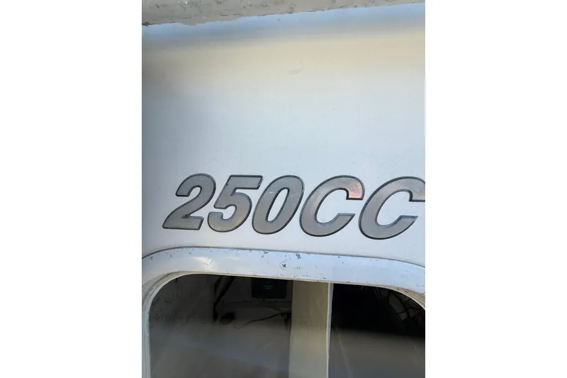 Slide: The Image of Close-up of 2012 Tidewater 250 CC Adventure boat model lettering. - 24