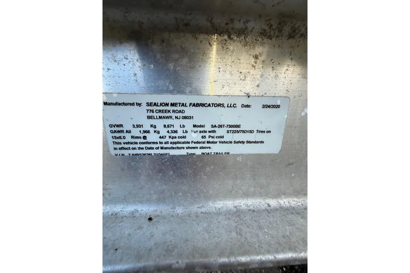Slide: The Image of Label on a 2012 Tidewater 250 CC Adventure boat trailer by Sealion Metal Fabricators. - 8