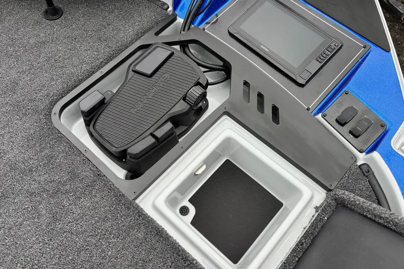 Slide: The Image of 2026 Triton 20XP Patriot boat console with Garmin pedal and display. - 6