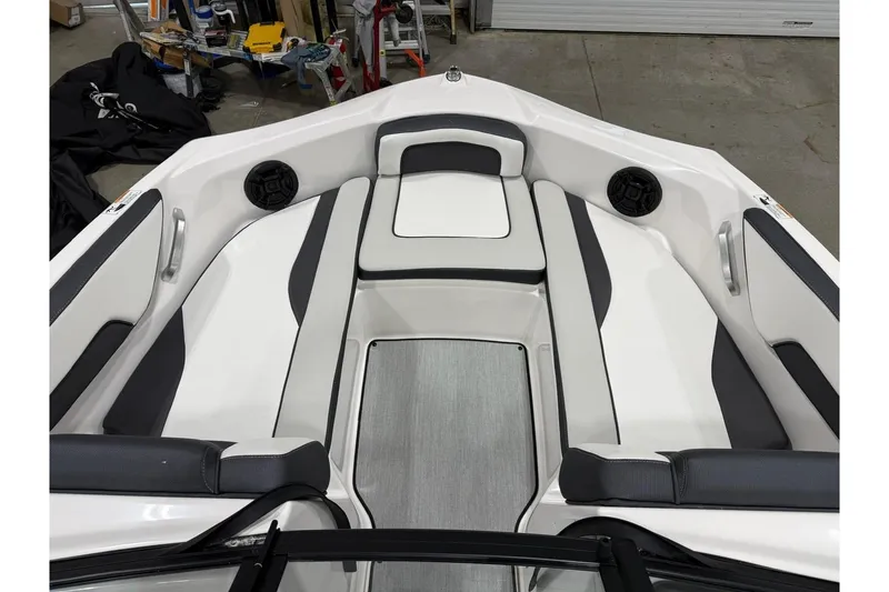 Slide: The Image of 2025 Yamaha Boats SX195 interior with sleek seating and modern design. - 3