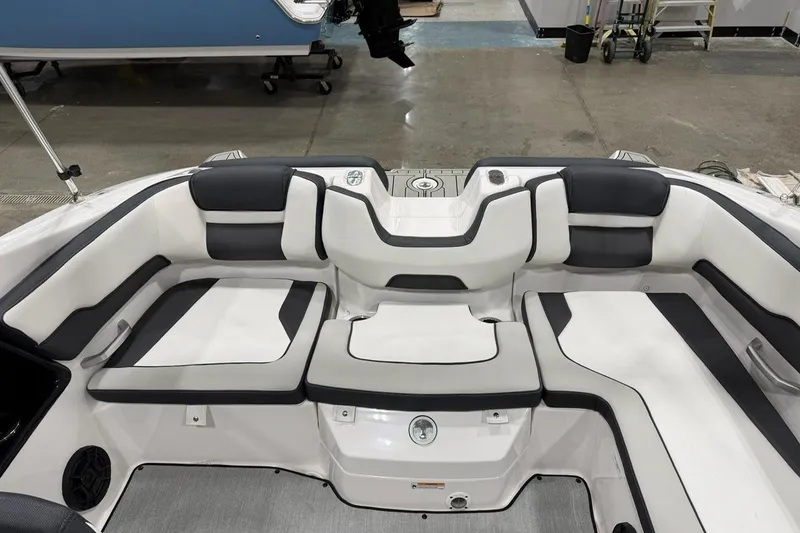 Slide: The Image of 2025 Yamaha Boats SX195 interior seating with sleek, modern design and comfortable upholstery. - 7