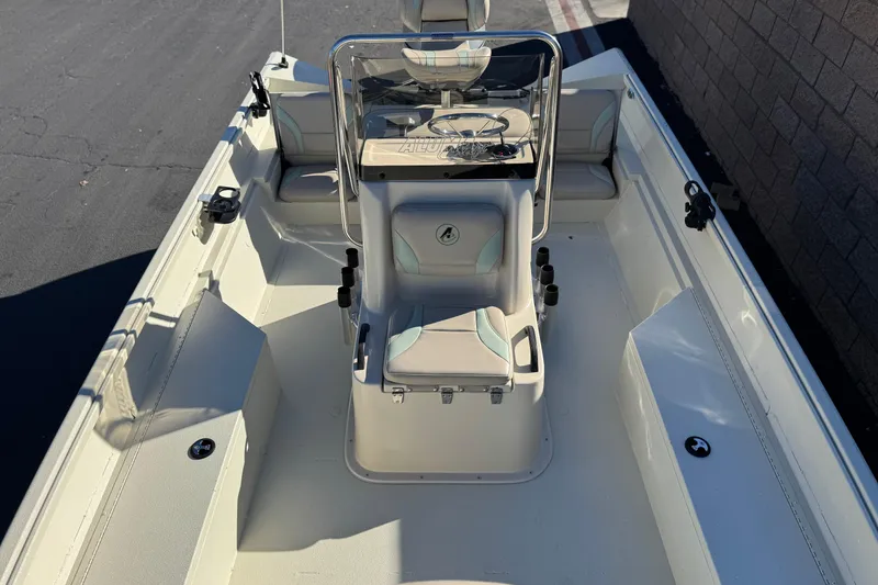 Slide: The Image of 2020 Alumacraft 2072 Bay boat interior with steering console and seating. - 17