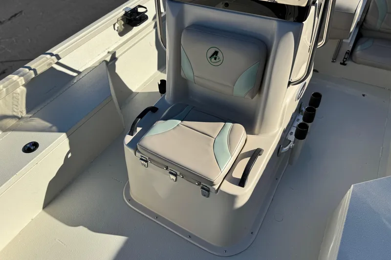 Slide: The Image of 2020 Alumacraft 2072 Bay boat interior with cushioned seating and storage. - 18