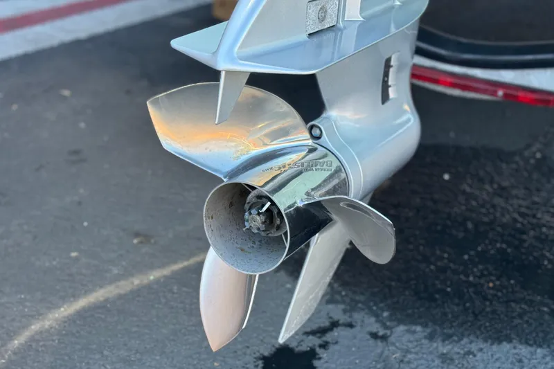 Slide: The Image of Propeller of a 2020 Alumacraft 2072 Bay boat on pavement background. - 8