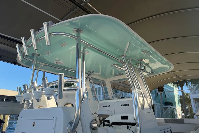Slide: The Image of Freeman 33 boat, 2013 model, with dual Mercury engines docked at marina. - 12