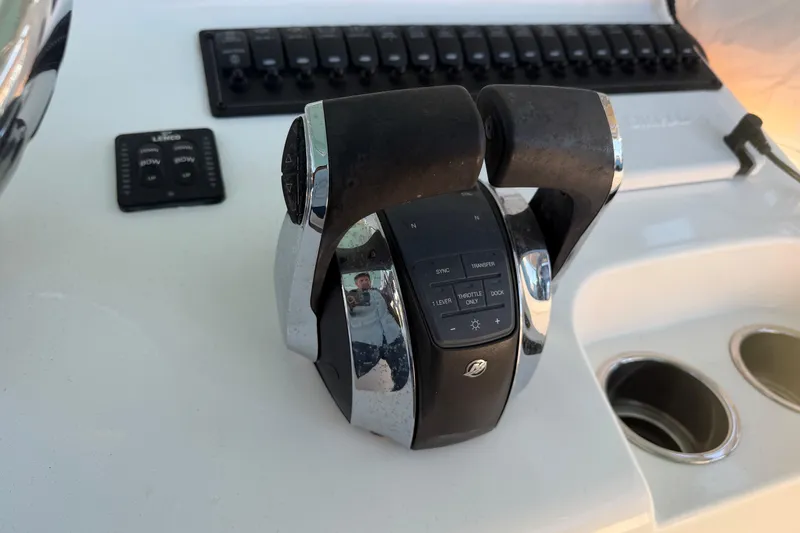 Slide: The Image of Control panel of a 2013 Freeman 33 boat with dual Simrad displays. - 24