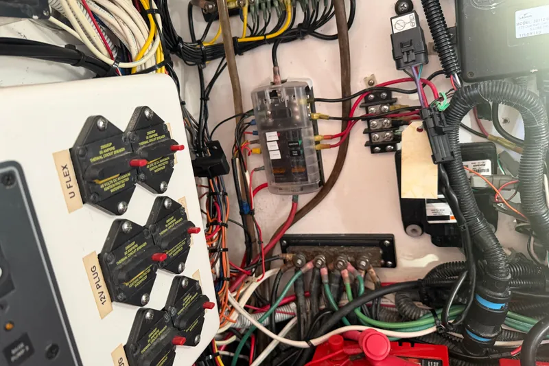 Slide: The Image of Close-up of Freeman 33 (2013) electronic connectors, labeled "Made in Mexico." - 34