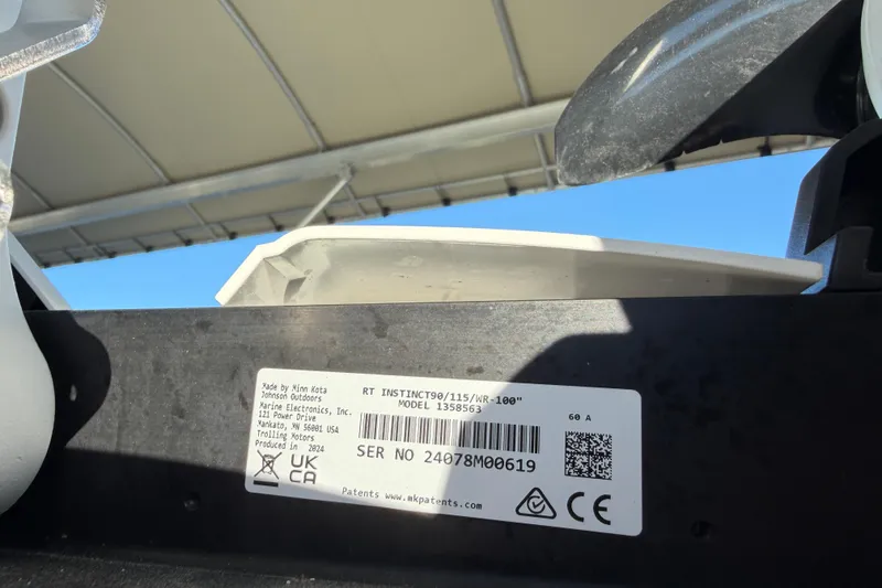 Slide: The Image of Freeman 33 boat deck, 2013 model, featuring non-slip flooring and storage compartments. - 5