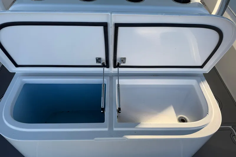 Slide: The Image of Freeman 33 boat canopy and structure, 2013 model, under a covered dock. - 52