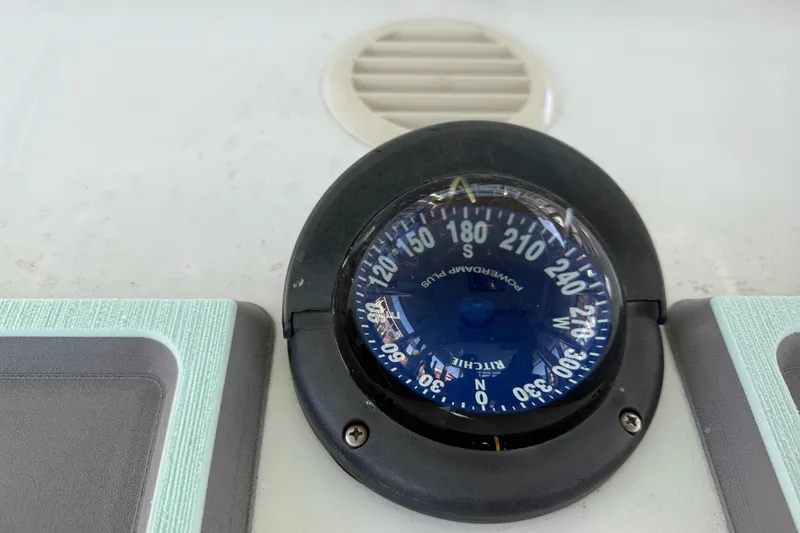 Slide: The Image of Display screen showing maintenance engine hours on a 2013 Freeman 33 boat. - 59