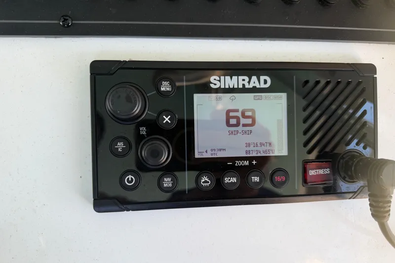 Slide: The Image of Boat compass on Freeman 33, 2013 model, showing navigation directions. - 62